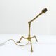 Articulated tripod lamp base in brass, Arts & Crafts style, in the manner of.