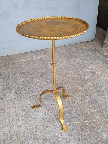 Minimalist brutalist gold metal pedestal table