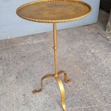 Minimalist brutalist gold metal pedestal table