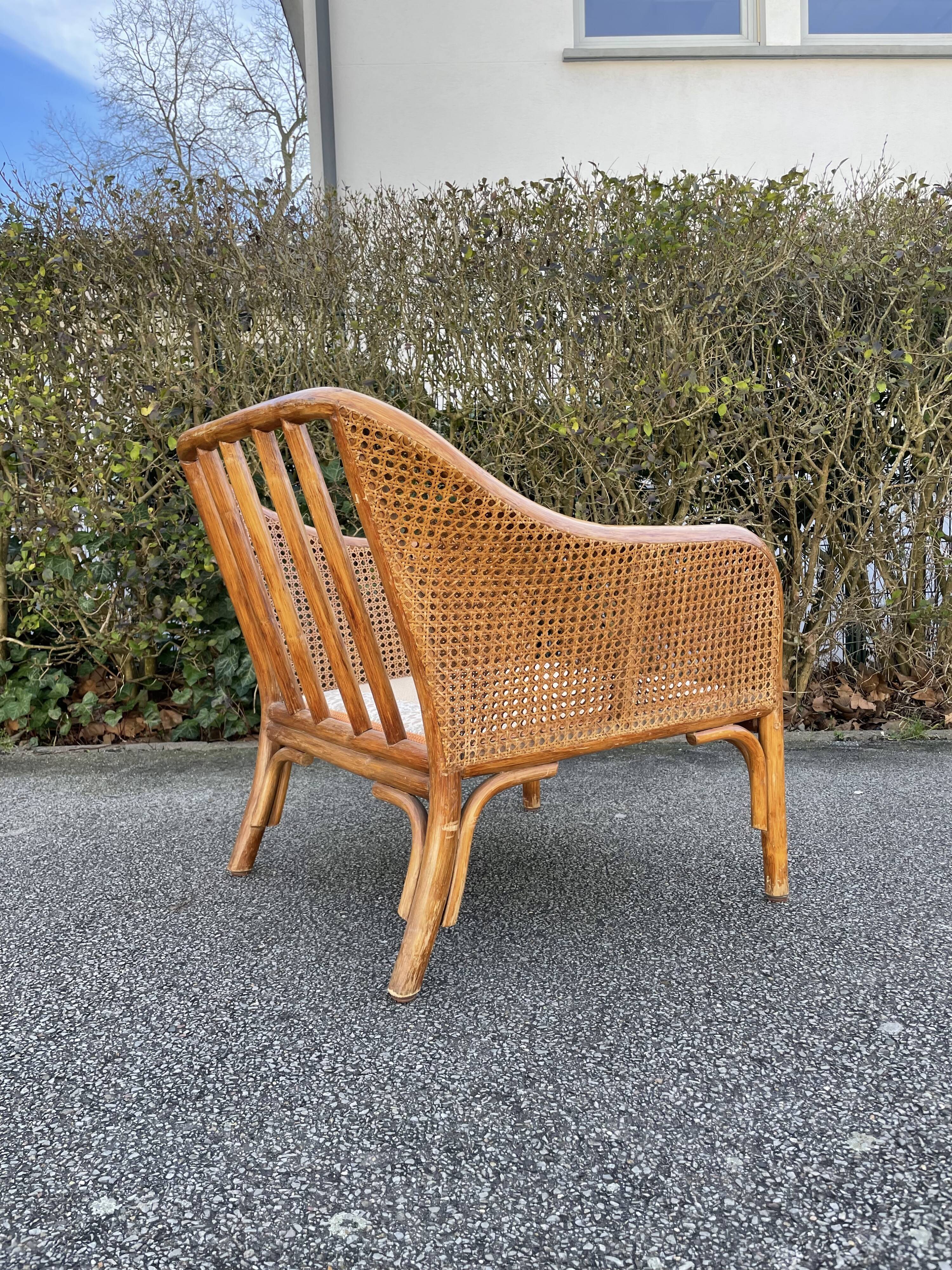 Paire de fauteuils en rotin et cannage