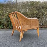 Pair of rattan and canning armchairs