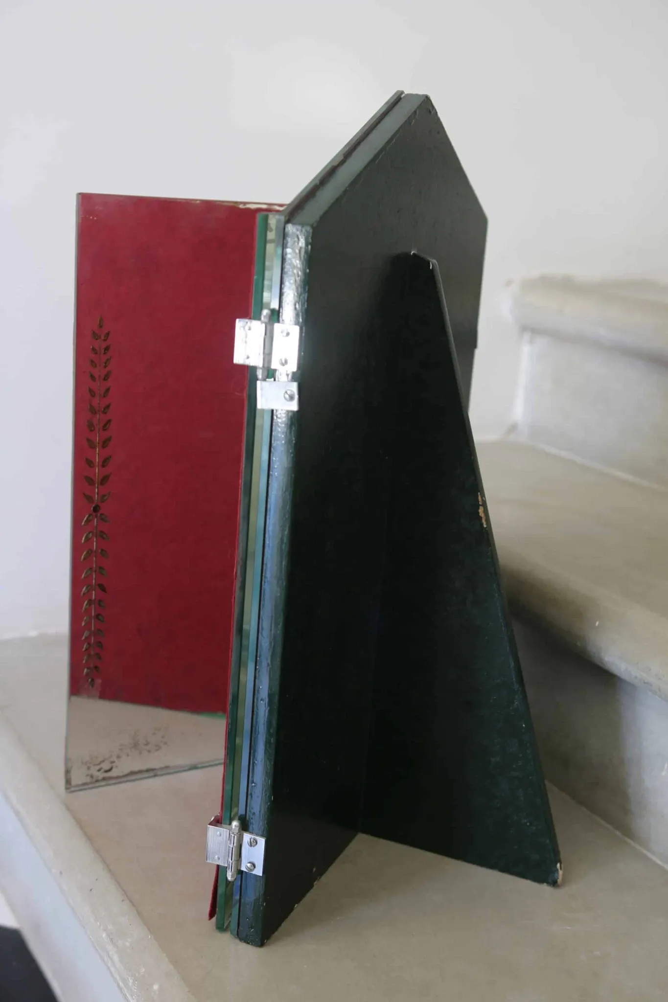 Triptych mirror with eglomisé and pediment, 1940s-50s