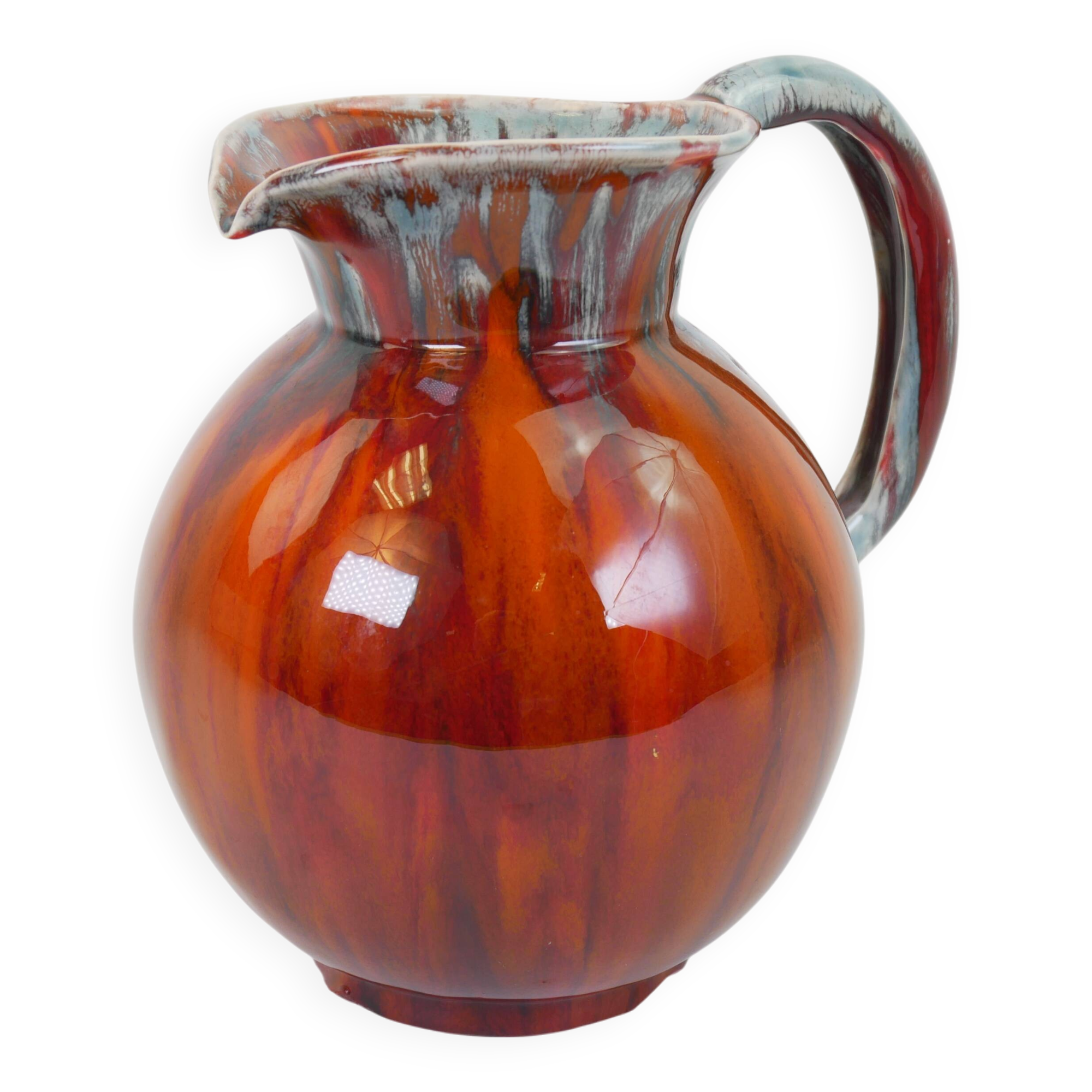 Pichet en céramique émaillée rouge et bleu signé Delène