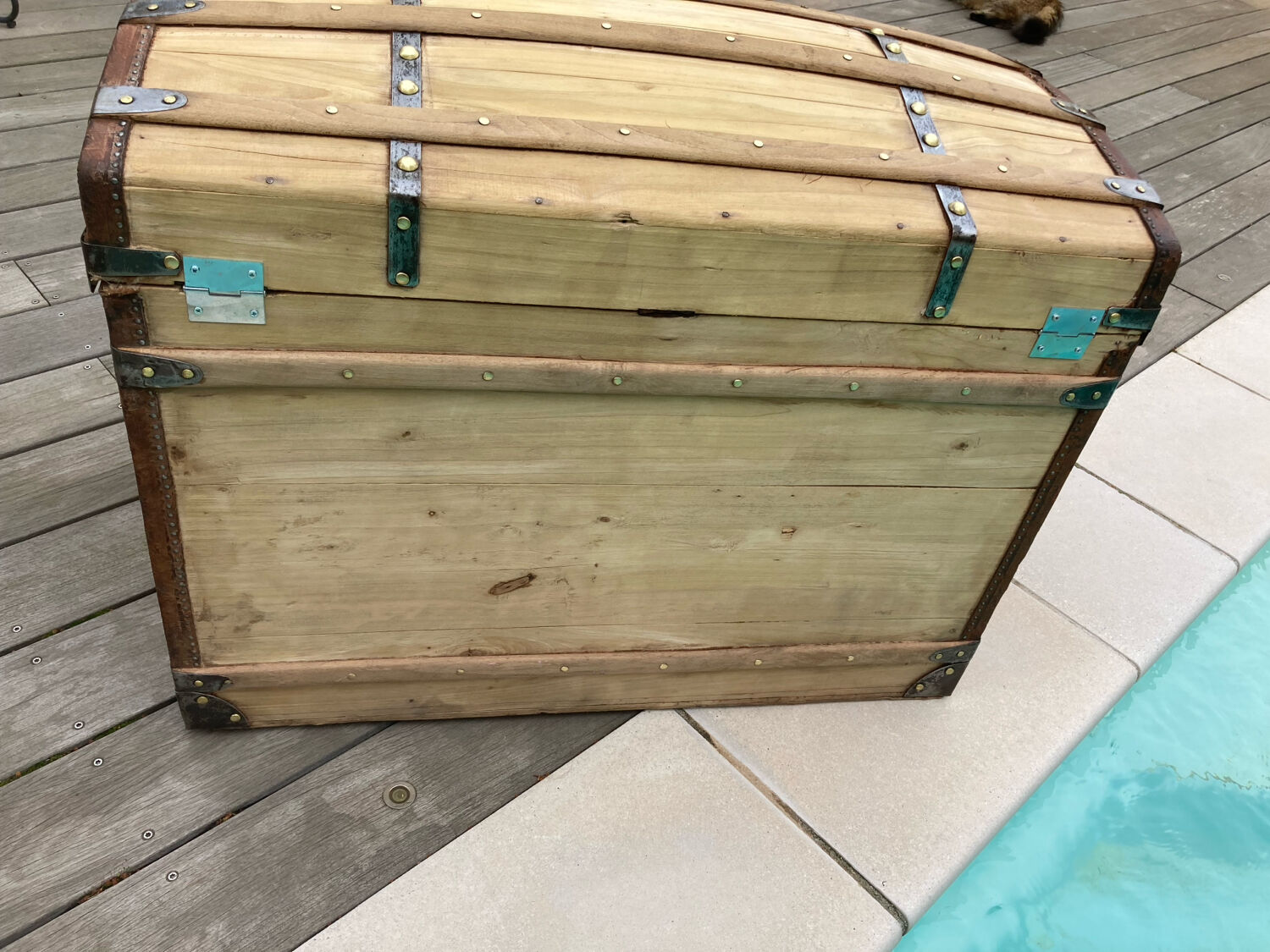 Exceptional curved leather/brass box with beautiful restored clasps.