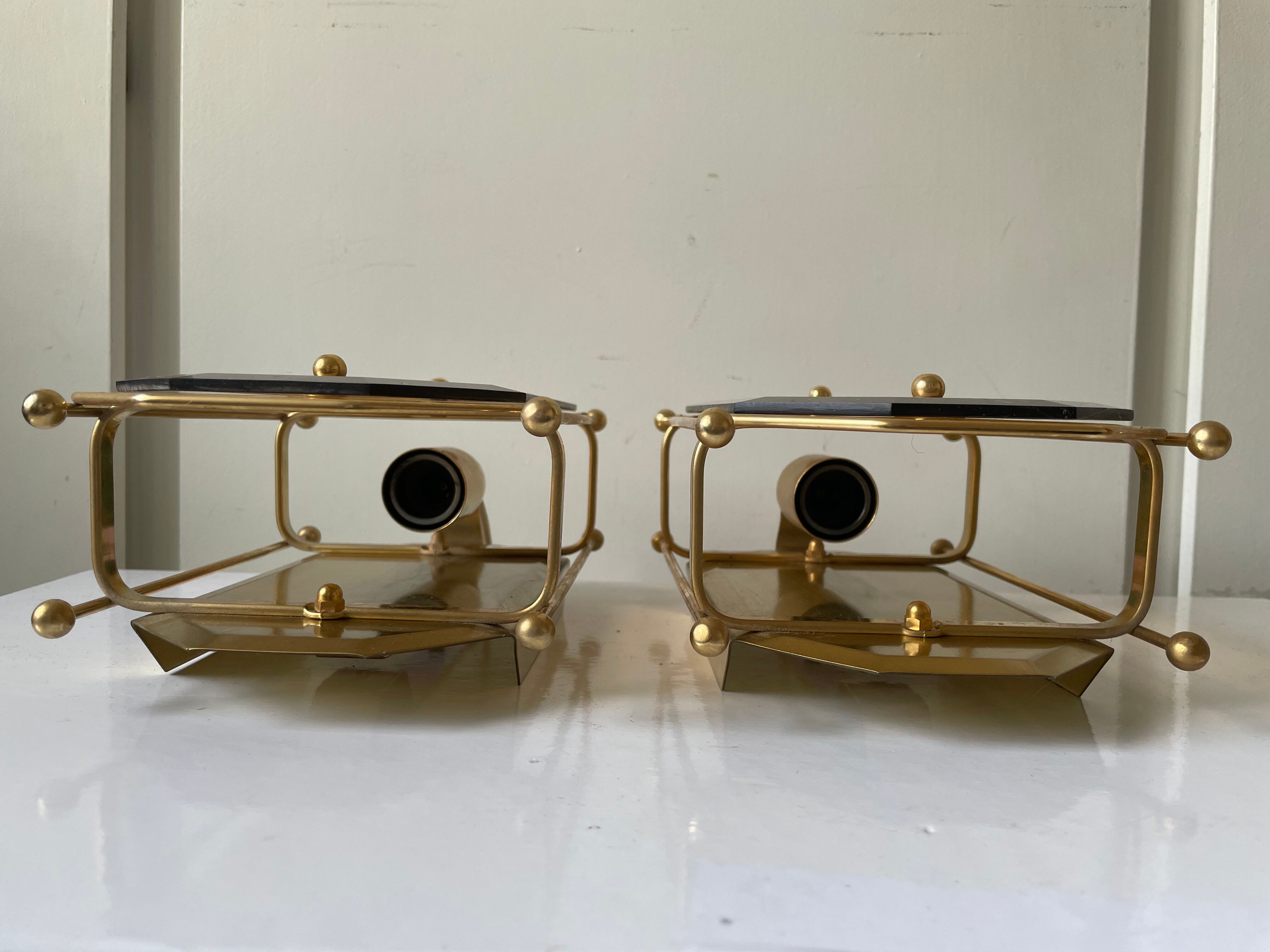 Pair of Scandinavian Vintage  wall light Sconce in Brass & Amber colored Glass