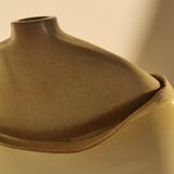 Ceramic with flattened body