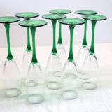 8 large green stem champagne flutes in very good condition.