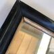 Miroir ancien bois noir et or
