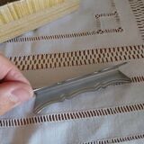 Old metal knife rests