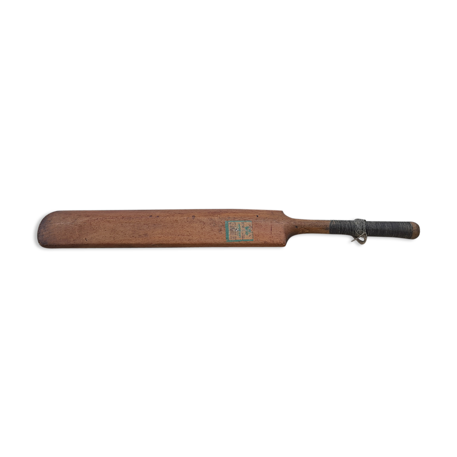 Ancient cricket bat in wood