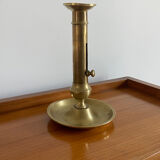 Antique brass push candle holder