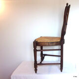 Lyre-shaped Chair bedded in natural wood with folder