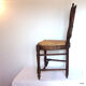 Lyre-shaped Chair bedded in natural wood with folder