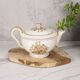 Porcelain tea service by Théodore Haviland, gilded patterns.
