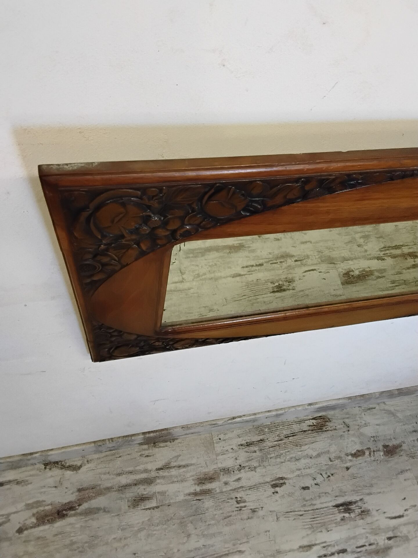 Art Deco mirror with a wooden frame