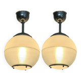 Pair of Holophane industrial design ball pendant lights