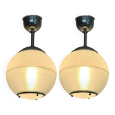 Pair of Holophane industrial design ball pendant lights
