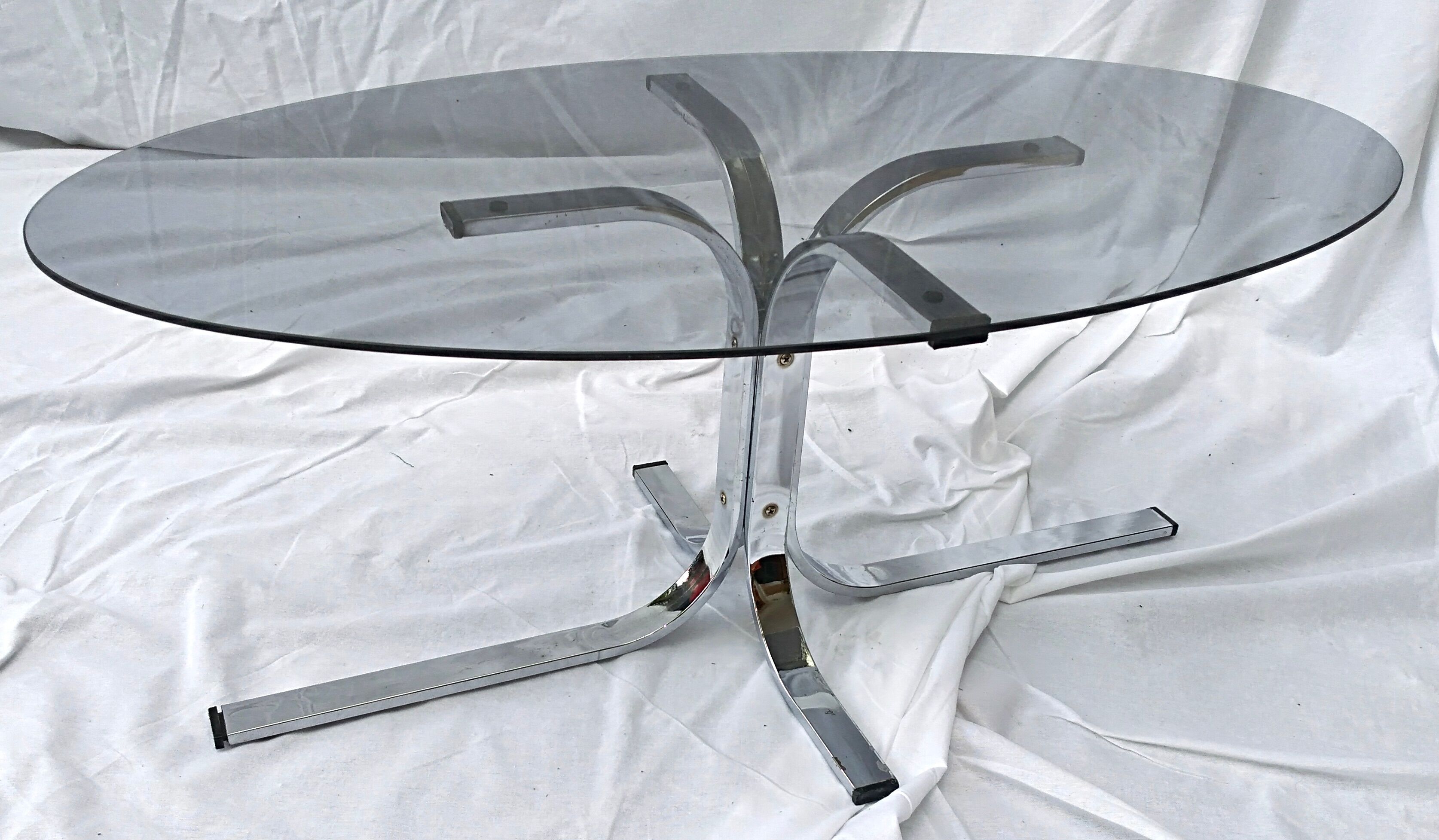 Oval glass coffee table smoked glass chromed metal