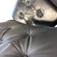Set of 2 vintage black leather armchairs / individual armchairs