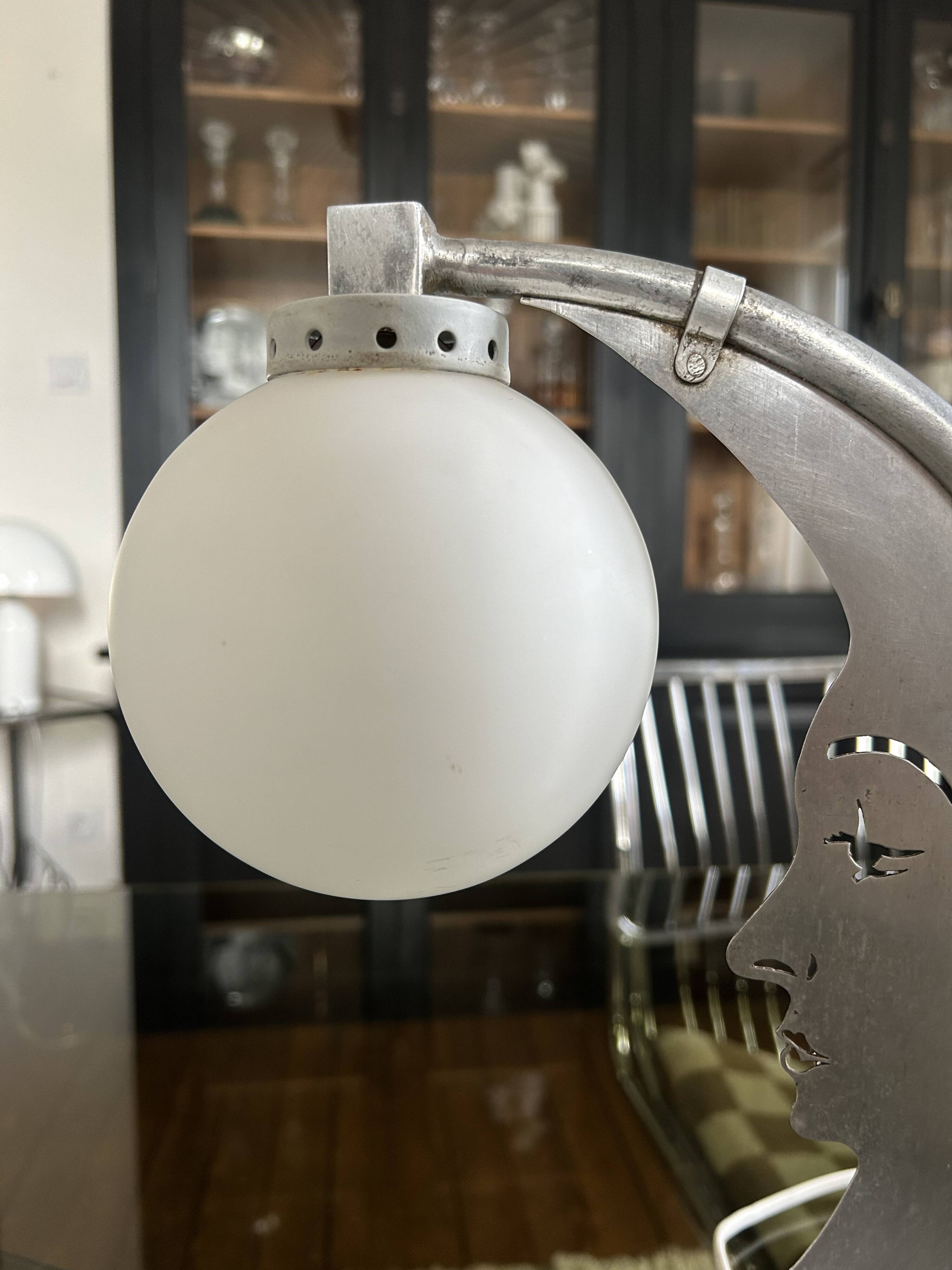 Moon lamp with face in aluminum and white opaline circa 1930