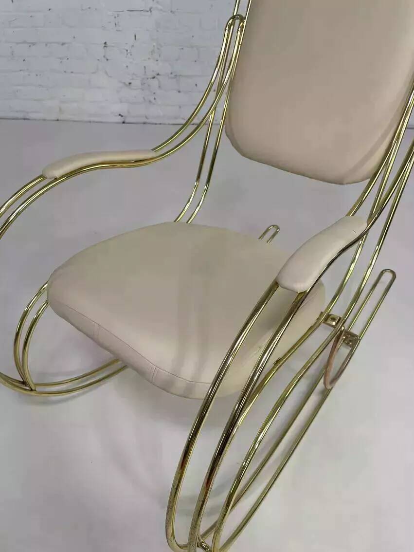 1960s rocking chair in brass and ecru imitation leather