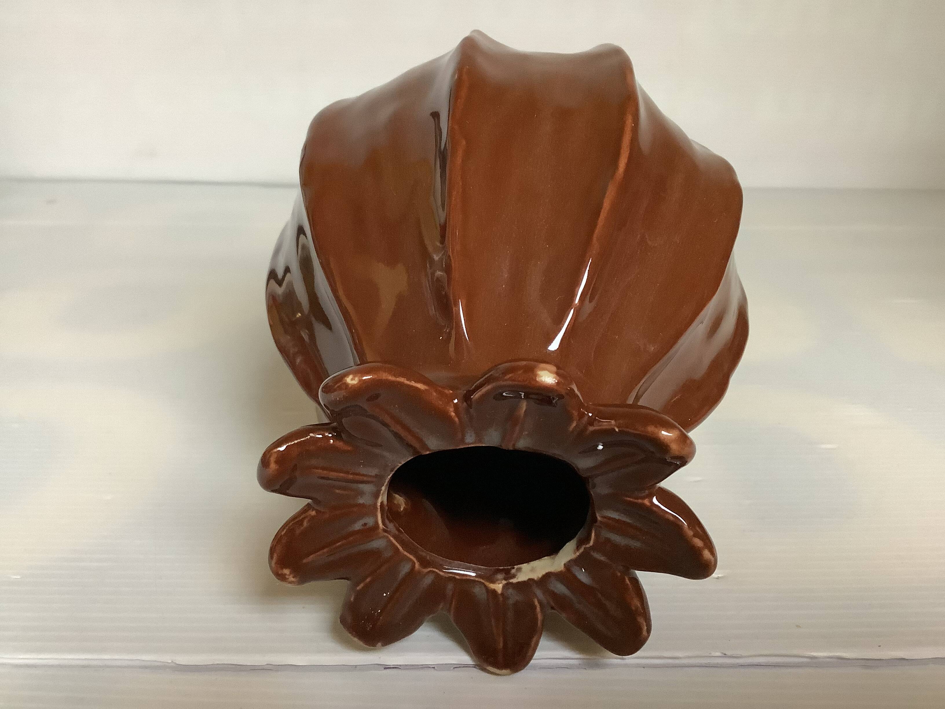 Brown ceramic corolla vase
