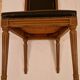 Antique Louis XVI style chair in solid wood and patinated leather.