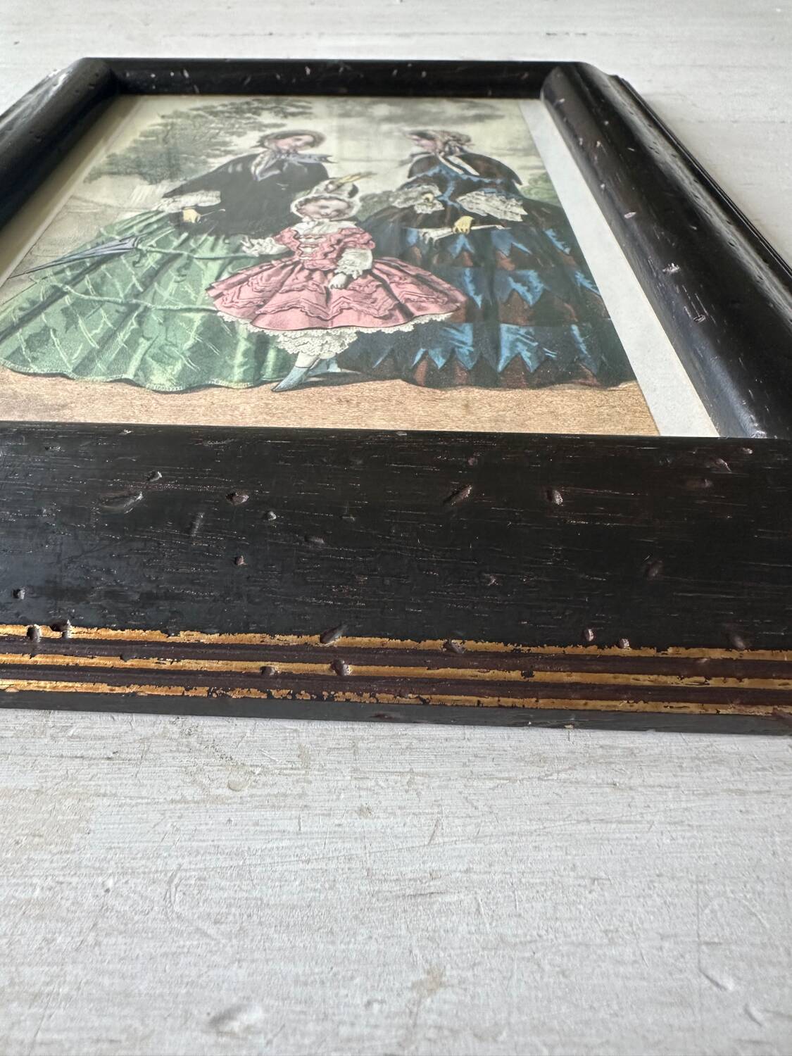 Old illustration in old black and gold frame