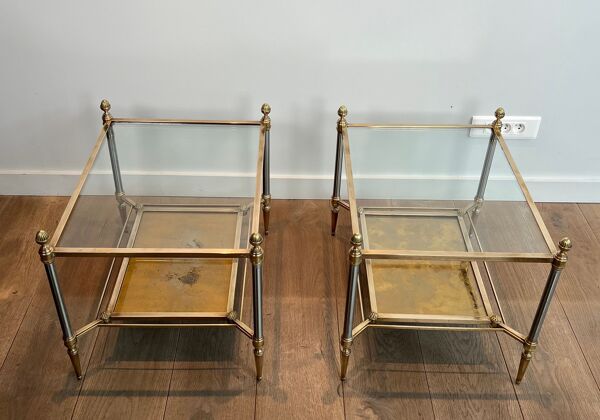 Paire de bouts de canapé de style néoclassique en acier et laiton de la Maison Jansen