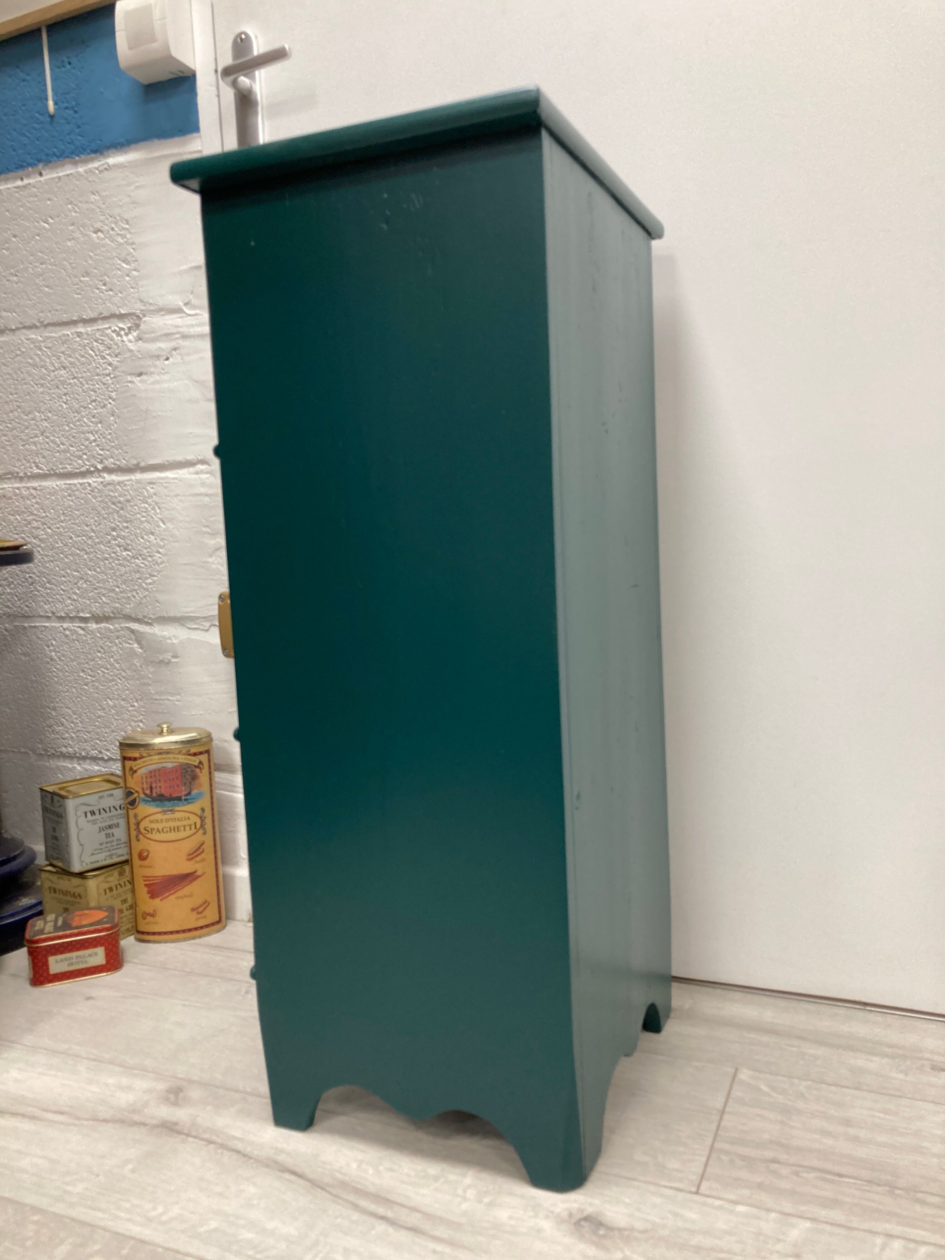 Two-door green bedside table
