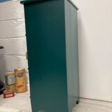 Two-door green bedside table