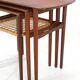 Rare set of three teak nesting tables with cane magazine rack / side tables / mid-century Danish modern design / 1950s / 1960s