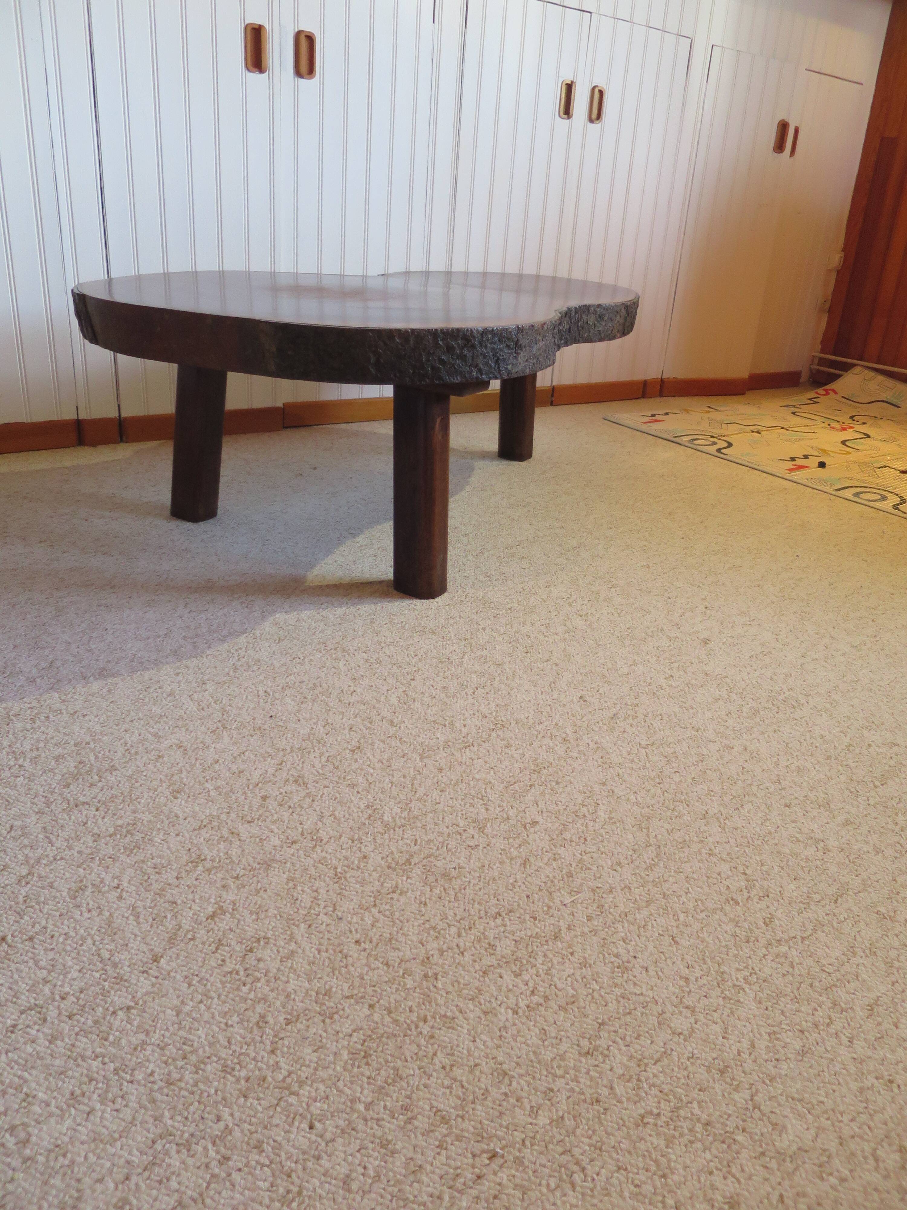 Tripod coffee table - solid okoumé wood - organic shape - brutalist style