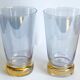 Orangeade set in colored glass