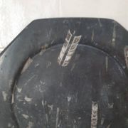 Decorative plate made of fossilised orthoceras marble.