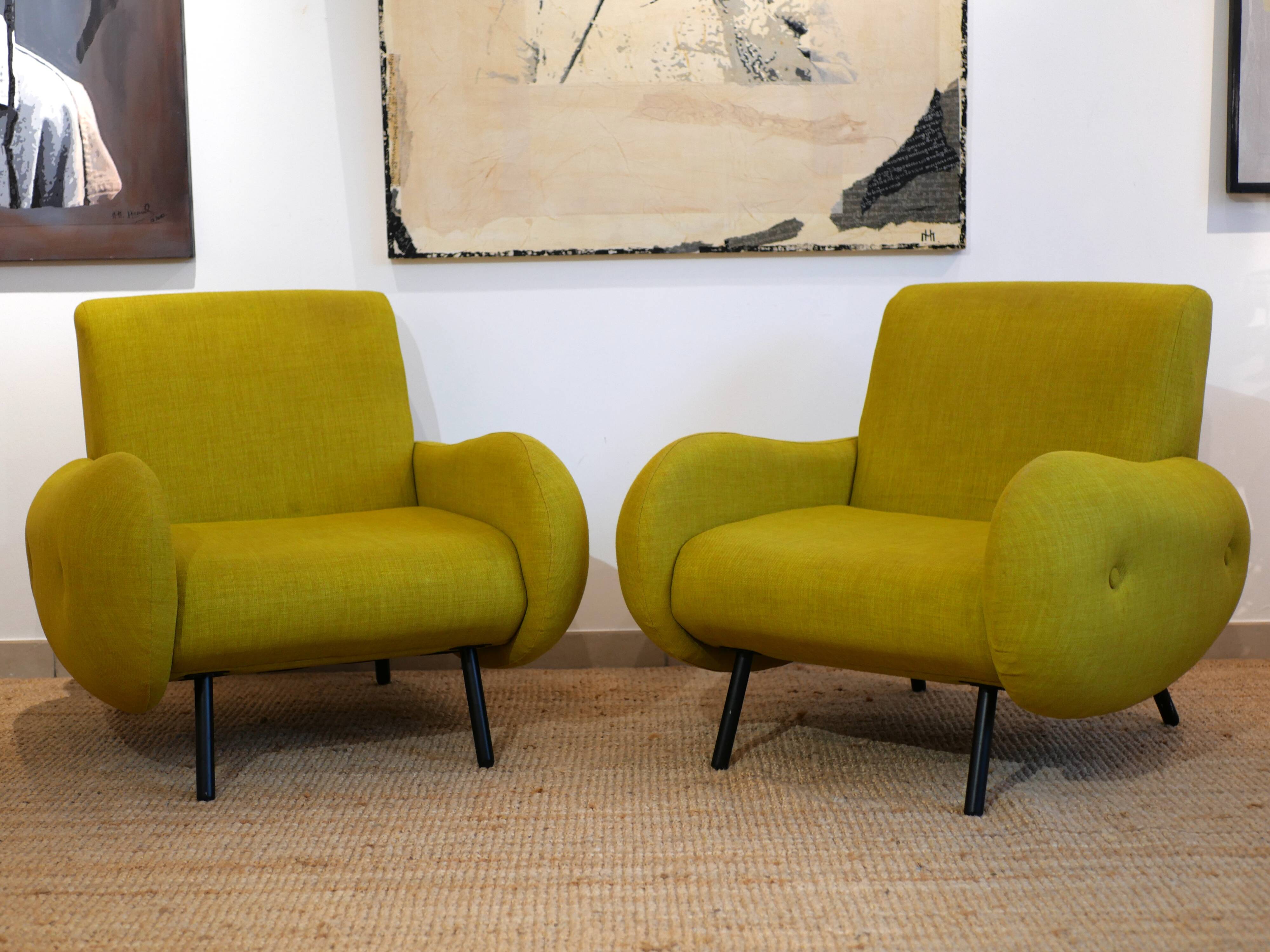 Pair of low armchairs in 60s–70s style