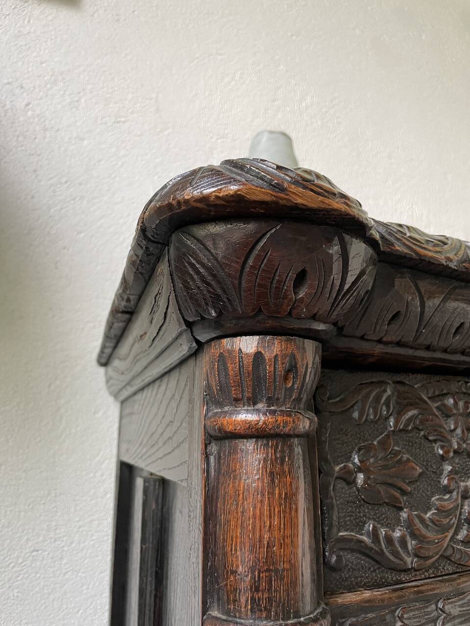 19th century chest of drawers in carved blackened pine