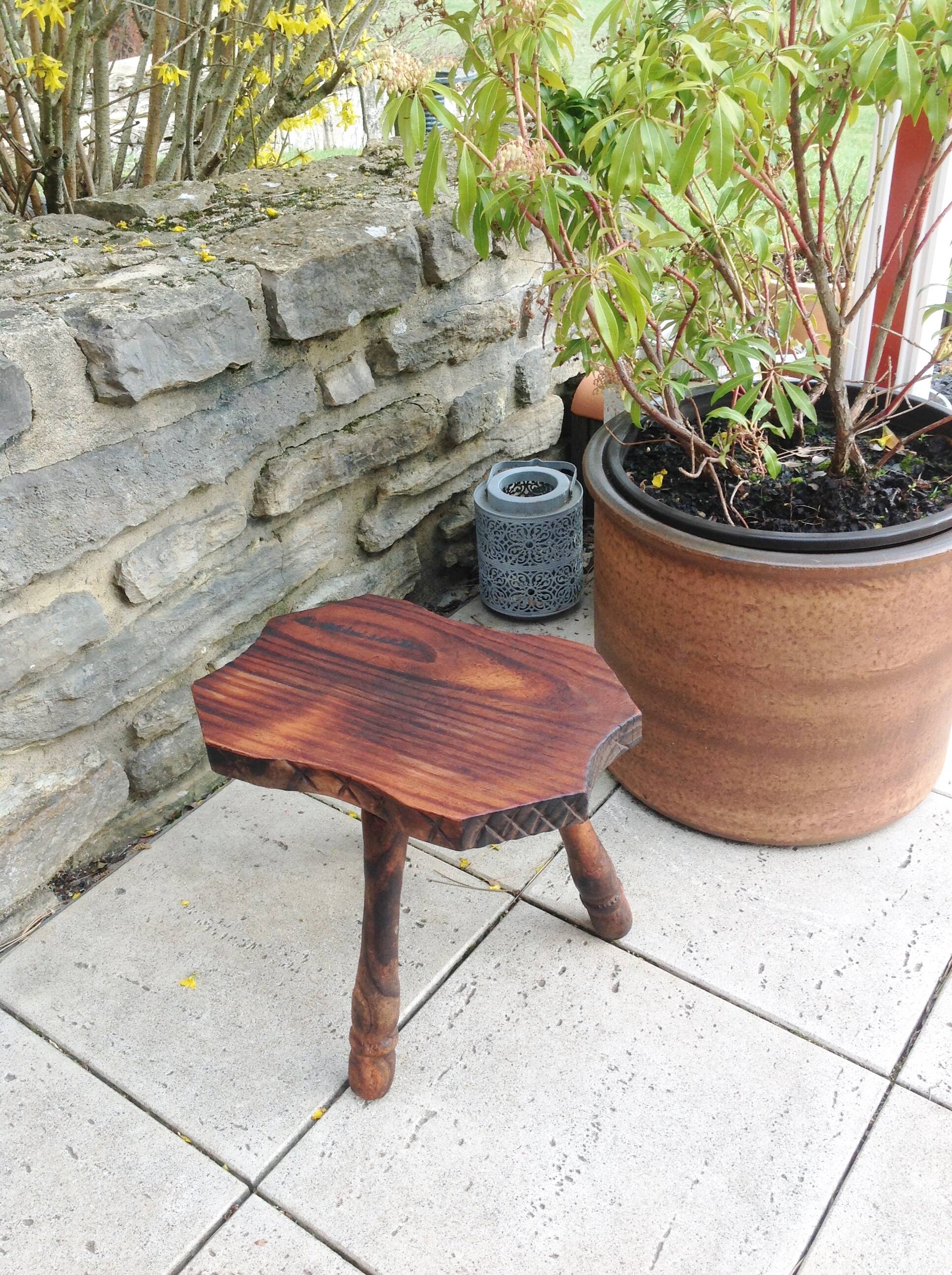Vintage brutalist wooden tripod stool from the 60s and 70s