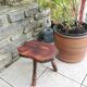 Vintage brutalist wooden tripod stool from the 60s and 70s