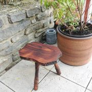 Vintage brutalist wooden tripod stool from the 60s and 70s