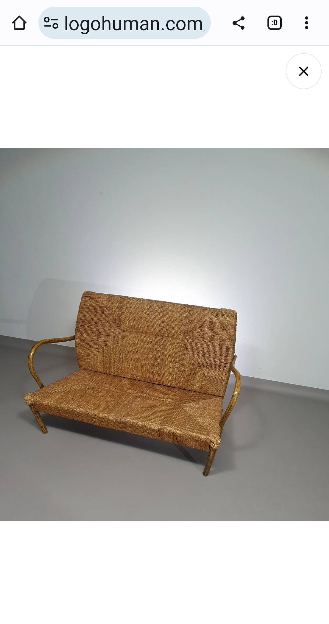 Vintage French papercord sofa with a metal frame base