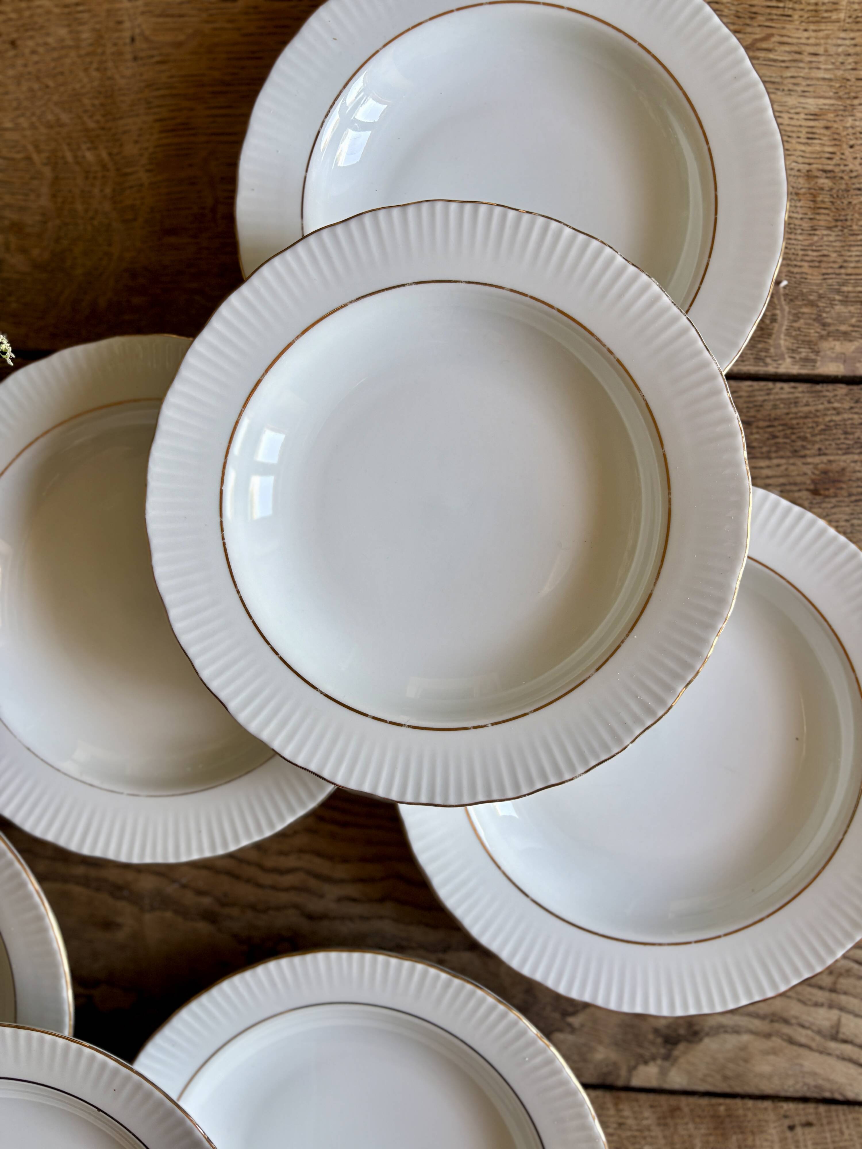 Set of 8 vintage deep plates in German porcelain.