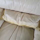 Fauteuil avec pouf en cuir et daim