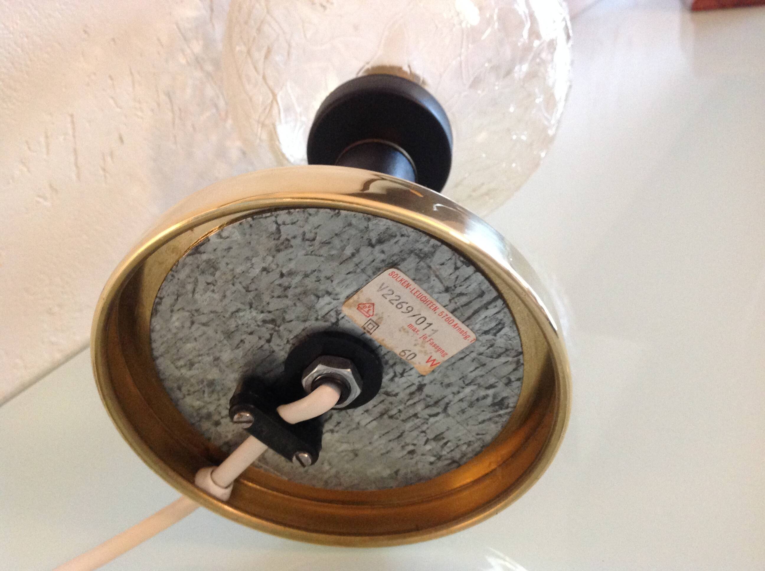 Structured amber glass globe lamp on black and brass base by Solken Leuchten/ 60s-70s