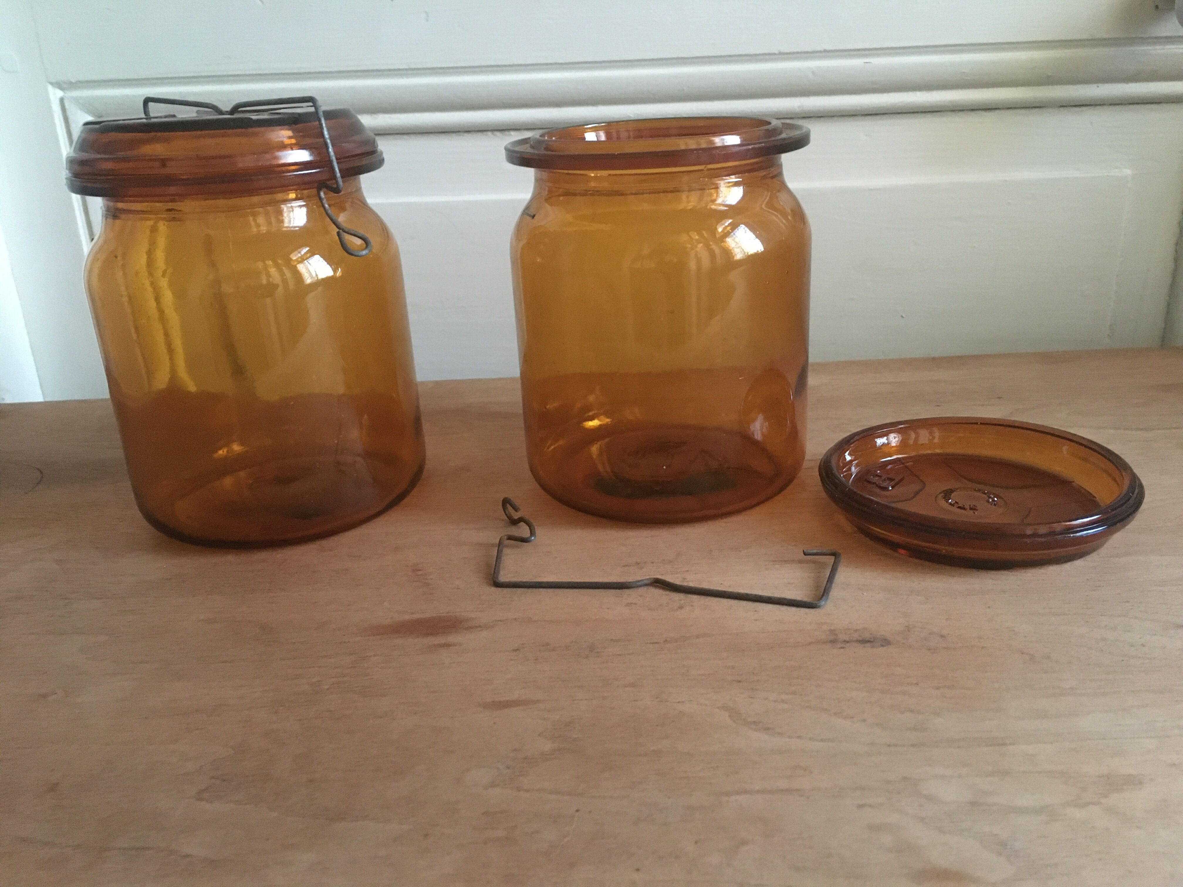Duo of amber BVB jars