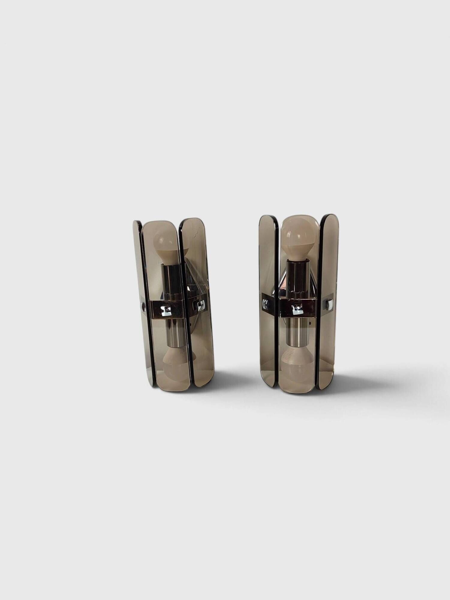 Pair of smoked glass and chrome wall lights attributed to Fontana Arte – Years
