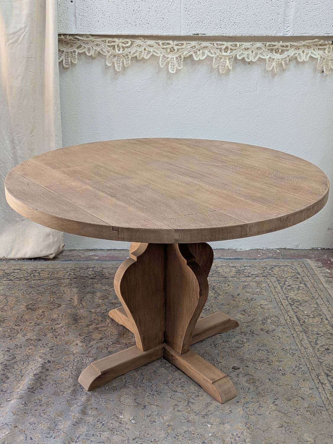 Round table in raw oak