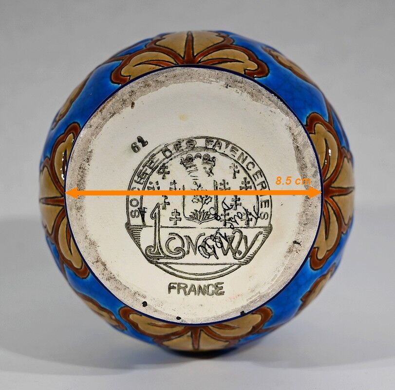 Vase decorated with flowers in enamels of longwy – early twentieth century