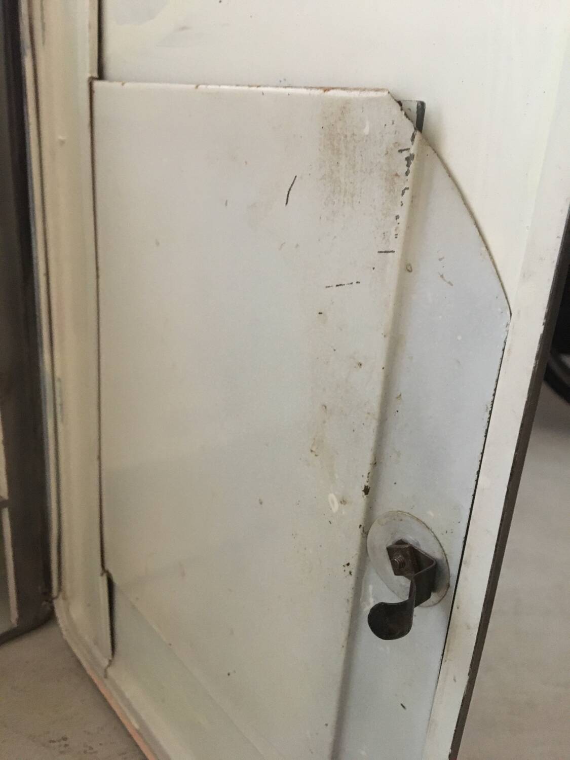 Gray metal medicine cabinet