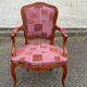 Bergère cabriolet armchair Louis XV in embroidered burgundy silk fabric.